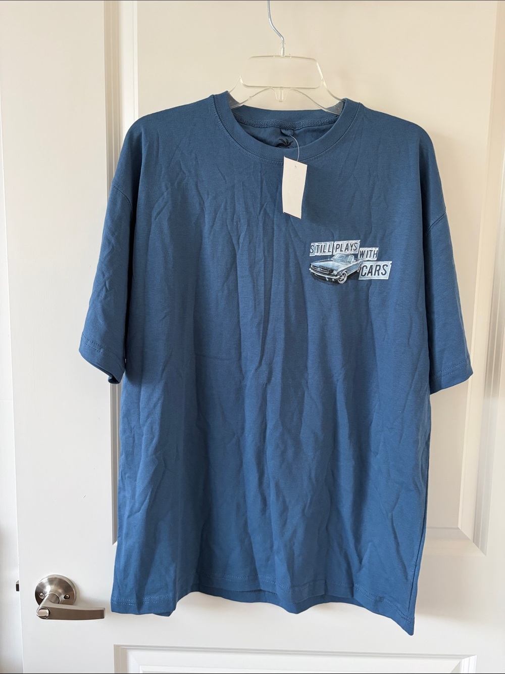 Vintage Newport Blue Ford “Still Plays With Cars” tee
